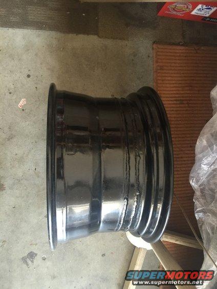 Black steel wheel, side view