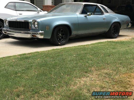 Light blue 1975 Chevrolet Chevelle coupe with a silver roof and black wheels