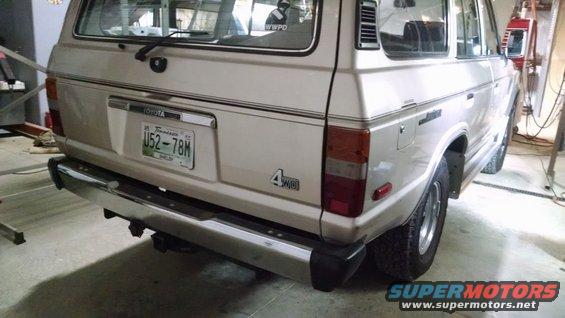 The hitch receiver seems to fit well, but it only has a round 4-pin connector with a very old electronic taillight adapter hanging from the underbody wiring.

The rear wiper blade is missing.