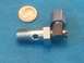 1983 Volkswagen Rabbit - A metal fuel pressure gauge fitting is shown next to a dime for size comparison.