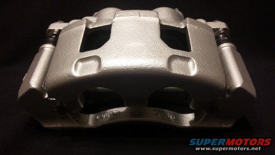 Silver brake caliper with visible text "407 7310"