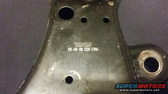Black metal automotive part with "520-168 089 12330 CHINA" stamped on it