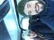 1995 Jeep YJ - Two individuals smile for a selfie from inside a vehicle during a winter outing.