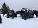 1995 Jeep YJ - Two Jeeps navigate a snowy terrain, with one prominently displaying its off-road capabilities.