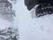 1995 Jeep YJ - A Jeep tire navigates through deep snow, suggesting off-road adventure in winter conditions.
