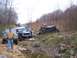 1978 Ford Bronco - A group of off-road vehicles are seen on a trail, with one vehicle appearing to be a Ford Bronco.