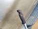 1978 Ford Bronco - Close-up of a damaged rubber handle attached to a metal rod, likely a vehicle part.