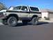 1979 Ford Bronco - This lifted 1979 Ford Bronco features a two-tone paint scheme and aggressive off-road tires.