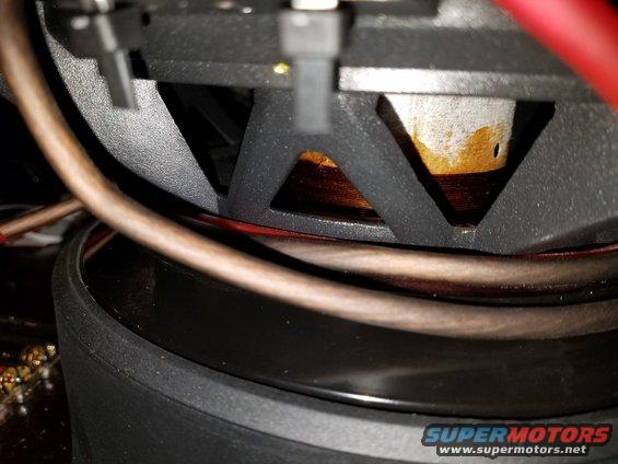 Speaker cone and wiring inside a car stereo system