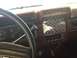 1986 Ford Bronco - Interior view of a 1986 Ford Bronco, diamond plate trim on the dashboard and visible gauges.