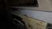 1996 Ford Bronco - The vehicle's body is being prepped for paint, with visible areas of primer and filler.