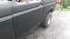 1996 Ford Bronco - Side view of a 1996 Ford Bronco in primer, ready for paintwork.