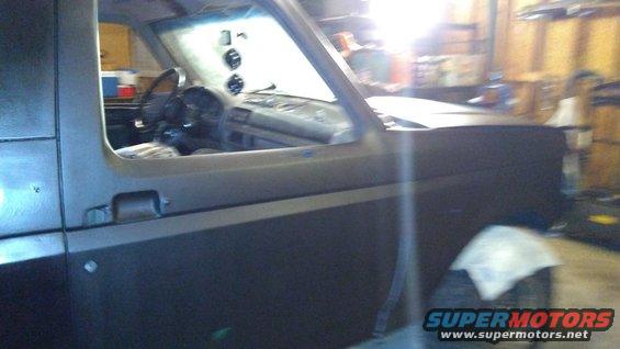 1996 Ford Bronco interior with gauges above dashboard