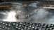 1996 Ford Bronco - This is a close-up view of a chrome bumper, showing scratches and two mounting holes.