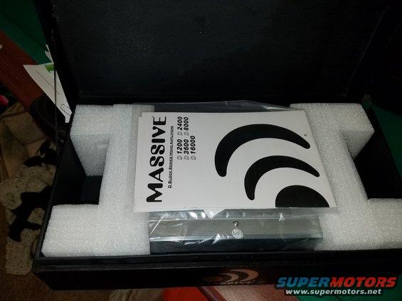 Massive D-Block Series Mono Amplifier in box with foam padding and manual