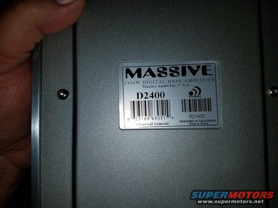 Amplifier with label 'MASSIVE 2400W DIGITAL BASS AMPLIFIER D2400' and barcode