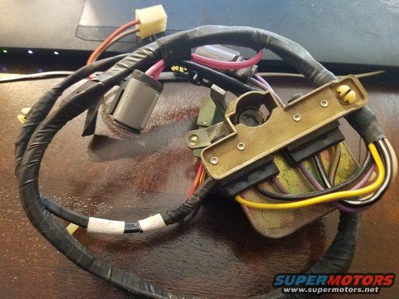 Automotive wiring harness with multiple connectors and colored wires
