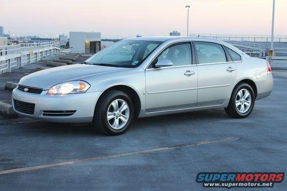 Silver 2007 Chevrolet Impala parked on a rooftop