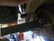 1988 Ford Bronco - A view of the vehicle's undercarriage, focusing on the spare tire and structural elements.