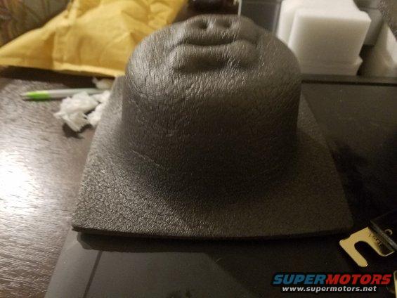 Dashboard speaker cover with textured surface