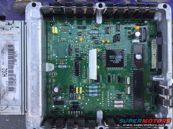Ford EEC-IV HUG2 engine control module with visible circuit board and connectors