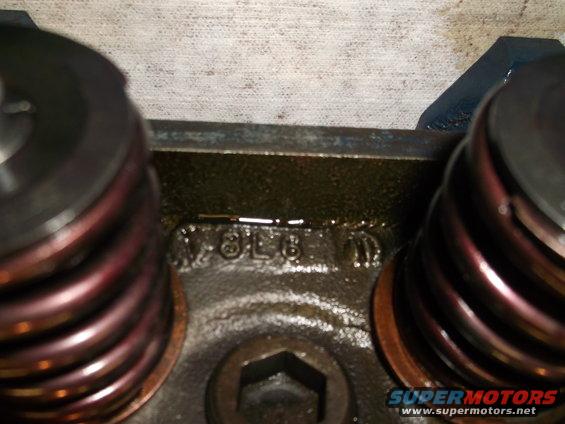 Engine part with casting numbers 78L8 10
