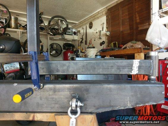 Metal frame clamped with Irwin clamp, part of a larger structure