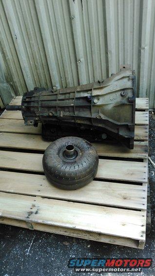 kimg0036.jpg goodbye old tranny. you served me well.

i originally pulled the tranny because i had a bad rear main seal leak and i already had the t-case off to rebuild it. once it was out i figuered this would be a good time to get a new one. this tranny had 280k on it and the reverse has been crippled for 3 years now. also i could feel it it starting to get abit of wear due to the torque from the 425ci beast. despite all that it worked flawlessly