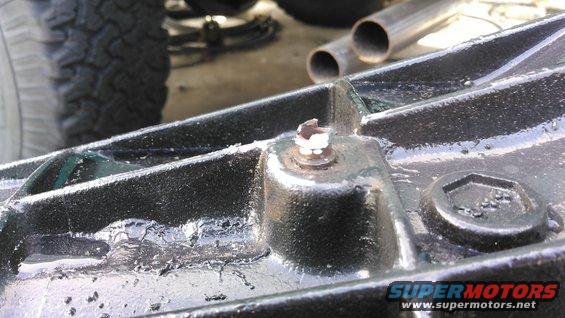 kimg0060.jpg i used a grinder to grind the top so it was narrow enough for transmission cooler hose to go over