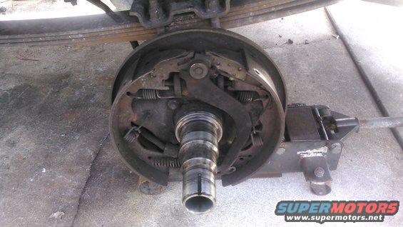 kimg0069.jpg take off the spindle nut and then you can pull the entire hub off.

the spindle seal will be abit stuck to the spindle, just pry it off