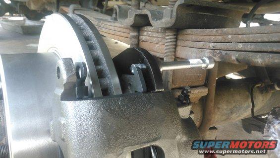 kimg0078.jpg issue i found is that i cant get the upper caliper pin in or out easily because of the leaf spring.

i debated keeping the bracket like this where its hard to disassemble/reassemble or i could rotatie it so its easier but might cause issues bleeding the brakes. i decided i shouldn't need to bleed the brakes often so i choose the later
