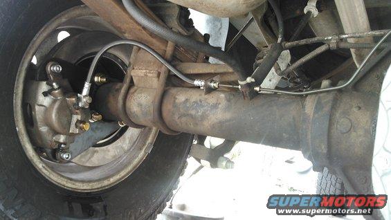 kimg0085.jpg i made a new pair of brake lines. driver side is going to be very short. the passenger side i formed to be line the original but shorter.

some kits have tabs that you can weld to the axle so it holds the brake hose