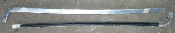 Windshield header trim removal. The 4 tape marks on the top side piece show where the tabs are located (both sides are symmetric).