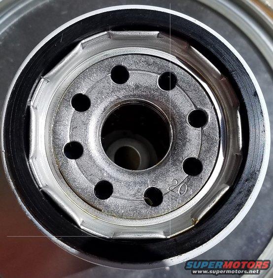 Oil filter with visible '20' marking