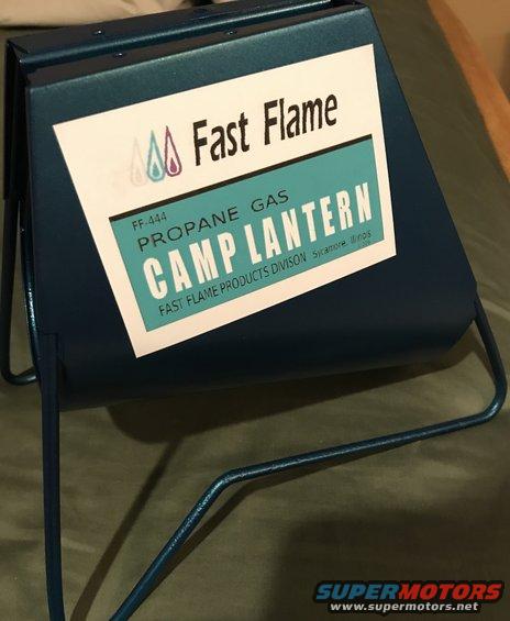 Blue metal propane camp lantern with a label that says "Fast Flame Propane Gas Camp Lantern"