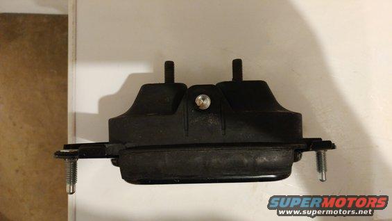 Black engine mount with two threaded studs on top and two bolts on the sides