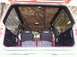 1987 Ford Bronco II - The interior of a 1987 Ford Bronco II shows a camouflage headliner and aftermarket racing seats.