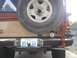 1987 Ford Bronco II - Rear view of a 1987 Ford Bronco II, equipped with a spare tire and a Hi-Lift jack.