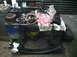1987 Ford Bronco II - Various automotive parts, including a differential and brake components, are laid out on a workbench.