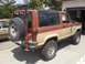 1987 Ford Bronco II - This 1987 Ford Bronco II is equipped with a rear-mounted spare tire and a Hi-Lift jack for off-road excursions.