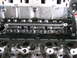1970 Ford Torino - This image shows internal engine components, specifically an engine block and cylinder head, with visible bolts and valve springs.