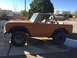 1969 Ford Bronco - This 1969 Ford Bronco is shown from the side with its top removed and a roll bar installed.