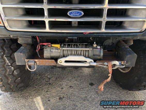 1994 Ford Bronco front end showing grille, bumper, and winch. The winch is rated for 12000 LB