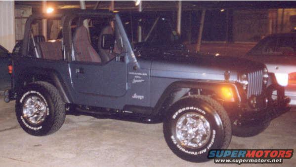 jeep.jpg 99 Wrangler Sport 5 speed in Gunmetal Pearlcoat. Mopar bars, American Racing wheels BFG A/T 31" tires...bad ass sound w/Sony in dash min-disc, 6 disc MD changer, Kenwood amps, 2 MTX subs, yee ha!!!! Sold and missin it!!!