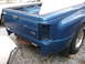 1971 Ford Ranchero - A blue pickup truck bed is shown from the rear, with a missing taillight and exposed fuel tank.