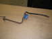1971 Ford Ranchero - This is a rusted metal linkage with a blue rubber bushing, not a 1971 Ford Ranchero.