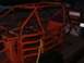 1990 Ford Bronco - An orange roll cage is seen on a trailer, with a license plate visible in the background.