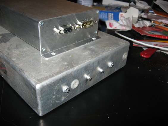 Two aluminum electronic enclosures with DB9 and DB25 connectors