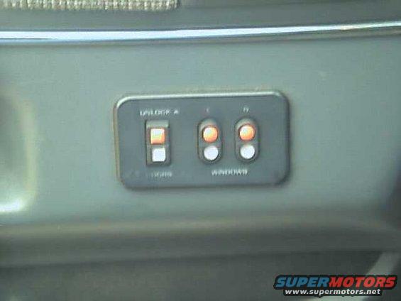 power_lock_windows.jpg Power door lock/window switch
