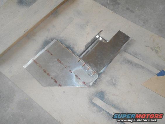 metal bracket with red markings that include 'KAISER' and '91-1992'